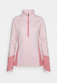 Světle růžový dlouhý rukáv pulovr s vysokým límečkem, čtvrtinovým zipem vpředu a kontrastními tmavšími růžovými pánelem na rukávech. Měkká, elastická látka.