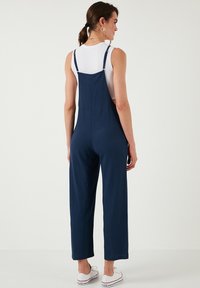 LELA REGULAR FIT - Kombinezonas su petnešomis - indigo