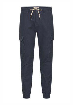 Jūras spēku krāsas kokvilnas cargo bikses ar elastīgām aprocēm, aukliņu jostu un divām sānu kabatām ar pogām.