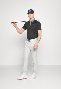 Puma Golf DEALER - Trousers - ash gray