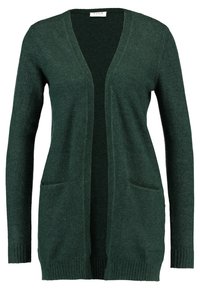 Dark green cardigan made of soft fabric, featuring an open front, two front pockets, and ribbed cuffs and hem. Minimalist design, no fastenings.