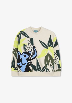 Sweat-shirt beige avec un motif d'éléphant bleu et des motifs de feuilles vertes. Col ras du cou, poignets côtelés et coupe décontractée.