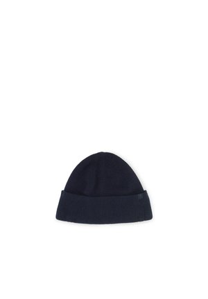 Dark navy blue knitted beanie hat with a folded brim placed on a white background.