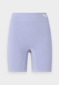Ribbed lavender biker shorts with a high waistband. Features a small logo accent on the upper left side. Simple, snug fit design.