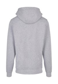 Felpa grigia con maniche lunghe e un grande cappuccio. Realizzata in un morbido tessuto testurizzato. Presenta un orlo dritto e polsini elasticizzati.