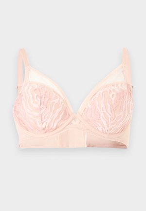 Soutien-gorge à armatures rose clair avec motif en dentelle sur les bonnets, bretelles réglables et bande en tissu lisse sur fond gris clair.