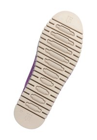 Purple textile sneaker with a beige rubber sole, featuring textured grip patterns and a rounded toe design. Size 37 indicated on the sole.