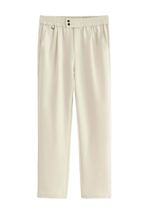 Pantalon de couleur crème avec une texture lisse, taille élastique, deux poches avant et deux boutons décoratifs à la taille.