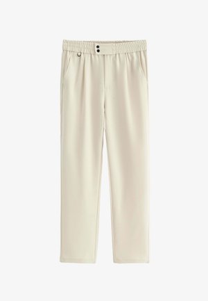 CHIC AVEC POCHES LATÉRALES - Pantalon classique - beige