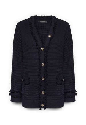 Zwarte gebreide cardigan met V-hals, gouden knopen aan de voorkant, franjerand en twee voorzakken met gefranjerde kleppen.