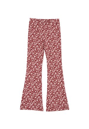 Raudonos plačios kelnės su baltu gėlių raštu, pasižyminčios lygiu paviršiumi ir priglaustu liemeniu, kuris pereina į plačią klešnę.