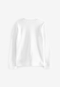 Chemise blanche à manches longues avec un col rond, faite en tissu à texture côtelée. Design simple, sans motifs ni accents visibles.