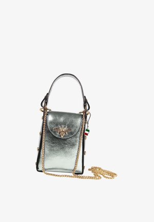 Small metallic silver handbag with a bee emblem on the flap, gold chain strap, and an Italian flag charm attached to the handle.