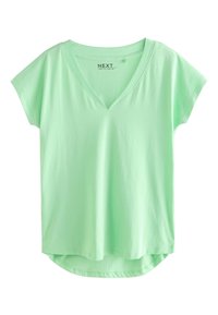 Heleroheline lühikeste varrukatega T-särk, sügava V-kaelusega, kumerate servadega ja pehmest puuvillamaterjalist. Sildil on sees "NEXT".