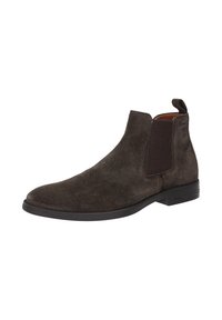 Bottines en daim marron foncé avec des panneaux latéraux élastiques, un bout pointu et une semelle en caoutchouc basse et plate pour le confort et la stabilité.