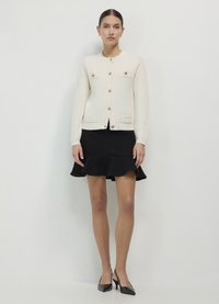 Calliope Strickjacke - gesso