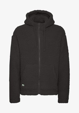 Čierna fleecová mikina s štruktúrovaným povrchom, plným zipsom vpredu a klokankovými vreckami. Obsahuje nastaviteľnú kapucňu so šnúrkou a hladké manžety.