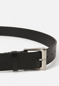 Black leather belt with a smooth texture, featuring a shiny silver metal buckle, adjustable with multiple holes along the strap.
