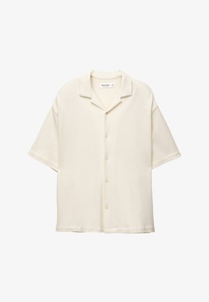 Korte mouwen overhemd met knoopsluiting in off-white textuurstof, met een camp collar, een relaxte pasvorm en vijf knopen aan de voorkant.