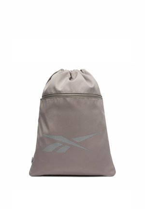 Zaino grigio con coulisse, dotato di una tasca anteriore con cerniera e del logo Reebok riflettente centrato sulla parte frontale.