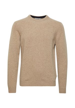 Bež pleteno pulover s krojnim izrezom, dolgimi rokavi in ribastimi manšetami. Gladka tekstura s subtilnimi odtenki barv.