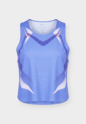 Hellblaues, ärmelloses Sporttop mit lila gepunkteten Wellenmustern und zwei kleinen pinkfarbenen Nike-Swoosh-Logos nahe an den Schultern.