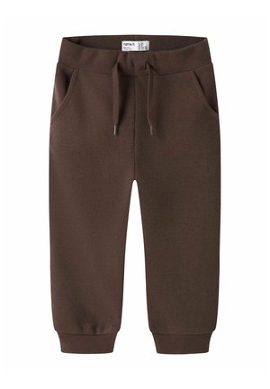 Bruine geribbelde peuter joggingbroek met elastische tailleband, voorzakken, trekkoord en omslag bij de enkels.