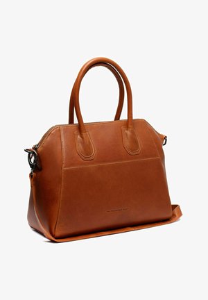 Brown leather handbag with dual top handles, zip closure, and removable shoulder strap, featuring a structured design and smooth texture.