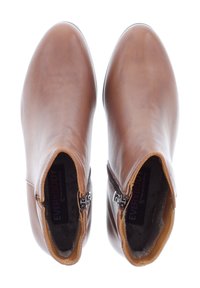 Botas de tobillo de cuero marrón con una textura suave, punta redondeada, cremalleras laterales y un forro interior suave. Diseño simple, sin adornos.