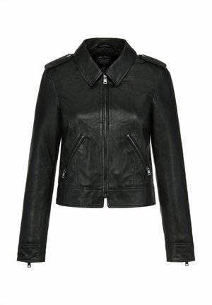 Czarna skórzana kurtka z kołnierzykiem, zapinana na zamek z przodu, z dwoma pionowymi kieszeniami na zamek. Posiada naramienniki i długie rękawy.