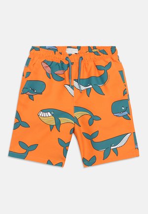 Világos narancssárga fürdőnadrág kék rajzfilmszerű bálnákkal és kék húzózsinórokkal ellátott elasztikus derékrésszel.