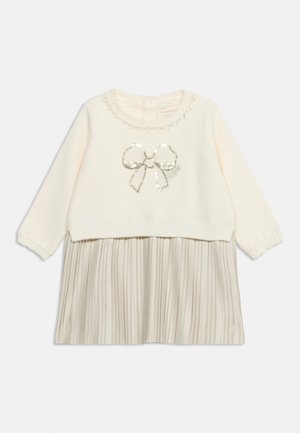 Guess, SET, mleczny