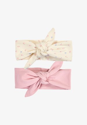 Deux bandeaux en tissu noués, l'un crème avec de petits motifs floraux roses et bleus, et l'autre uni rose clair.