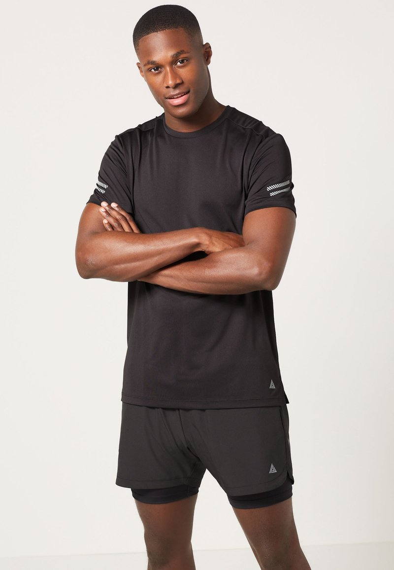 Next - Camiseta deportiva - black, Ampliar