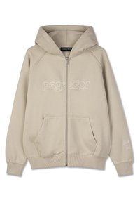 Bézs színű cipzáras kapucnis pulóver, puha anyagból készült, elülső logóval, két zsebbel, bordázott mandzsettákkal, és a "Tedd meg a jövőért" felirattal az ujjon.