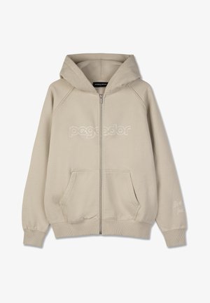 Bézs színű cipzáras kapucnis pulóver, puha anyagból készült, elülső logóval, két zsebbel, bordázott mandzsettákkal, és a "Tedd meg a jövőért" felirattal az ujjon.