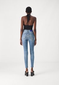Karl Lagerfeld Jeans SKINNY - Aptempti džinsai - real visual acid mid blue