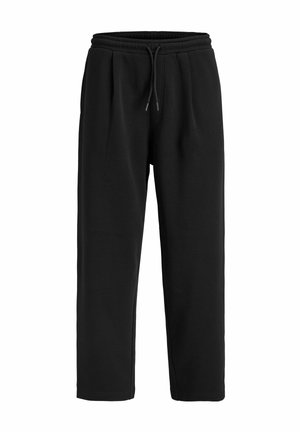 Pantaloni sportivi neri realizzati in tessuto morbido, con una cintura elastica e cordoncino, e tasche laterali. Taglio dritto con pieghe.