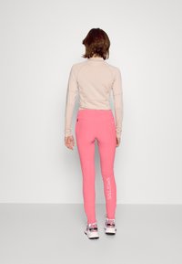 Salewa AGNER - Leggings - calypso coral