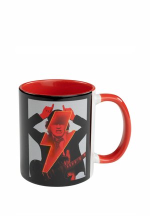 Black mug with red interior and handle, featuring a person playing guitar with red lightning bolt overlay on the front.