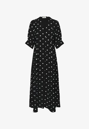 Fekete maxi ruha fehér pöttyökkel, V-nyakú, elöl gombos, rövid, felhajtott ujjú és lobogó anyagból.