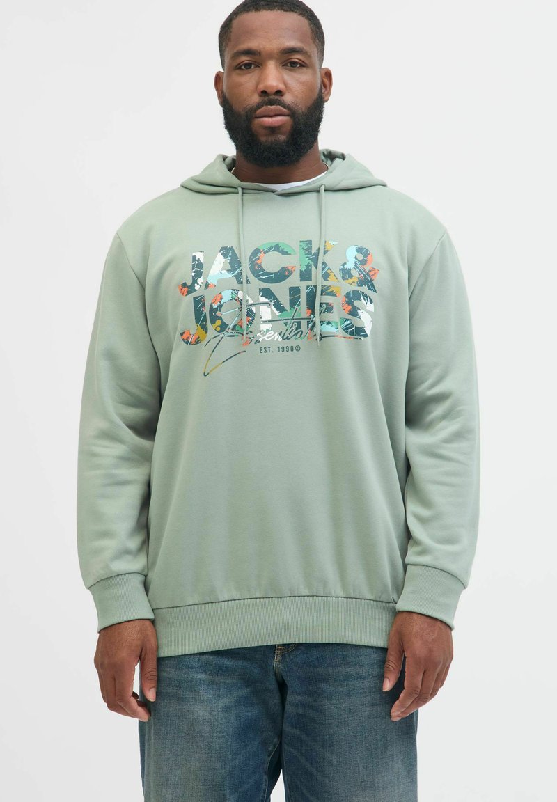 Lichtgroene hoodie met een grafische print met de tekst "JACK & JONES Essentials". Ribgebreide manchetten en zoom, zachte stof, relaxte pasvorm.