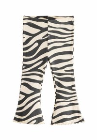 Leggings évasés en imprimé zèbre noir et crème avec texture côtelée et ourlet volanté, présentant une silhouette ajustée et une taille élastique.