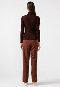Touché Privé Sweter