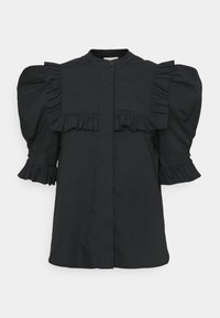 Blusa nera in cotone caratterizzata da maniche a sbuffo, dettagli plissettati, chiusura con bottoni e rifiniture a volant lungo le spalle e i polsini.