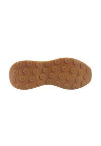 Brown rubber shoe sole with round textured grips and embossed brand initials. Slight curve towards the toe, smooth overall finish.