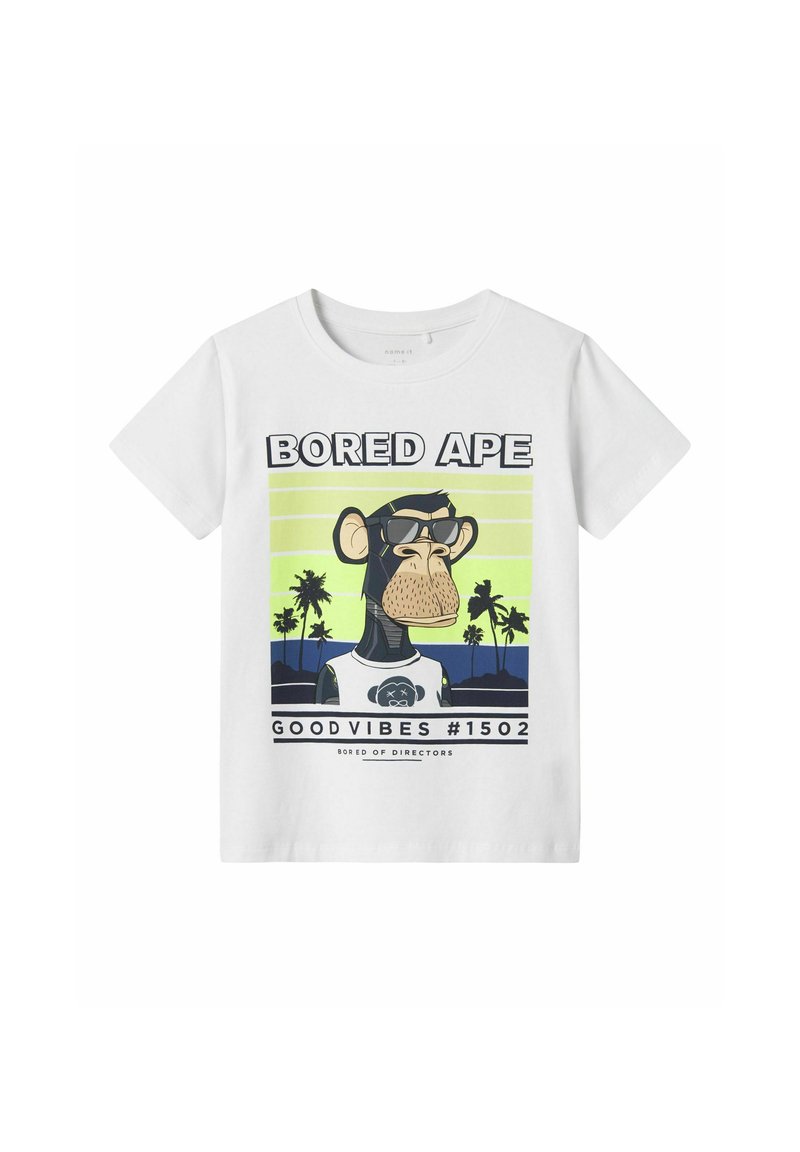 Hvid bomulds T-shirt med et grafik af en tegneserieabe iført solbriller. Baggrunden inkluderer palmer og en grøn-blå gradient.
