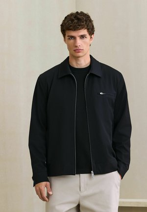 Next, REGULAR FIT - MOTIONFLEX SMART TWILL ZIP SHACKET - Light jacket - black