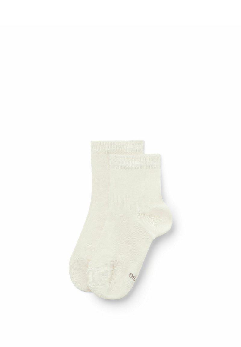 Bomuldsstrømper i en blød off-white farve. Kort crew-længde med en glat tekstur. Forstærket tå og hæl for holdbarhed.