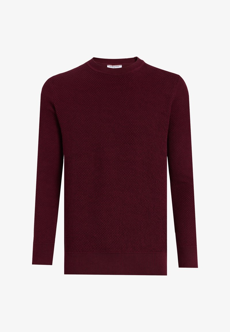 Bordeauxrode gebreide trui met een gestructureerd patroon, ronde hals en lange mouwen. Geribbelde manchetten en zoom zorgen voor structuur. Zachte, warme stof.